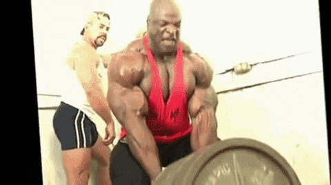 Ronnie Coleman, eight-time Mr. Olympia, performing a heavy T-bar row on an anchored, plate-loaded bar